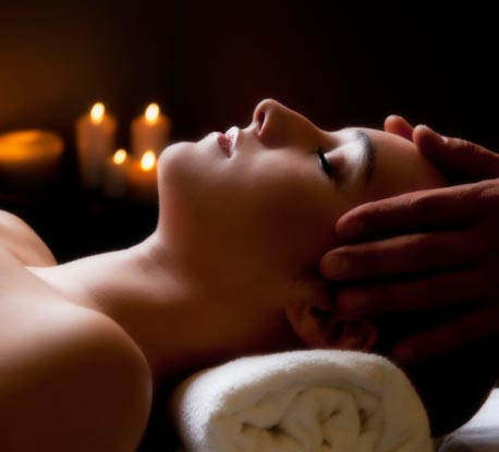 ascent-spa-woman-candles-458x415-istock_15410776